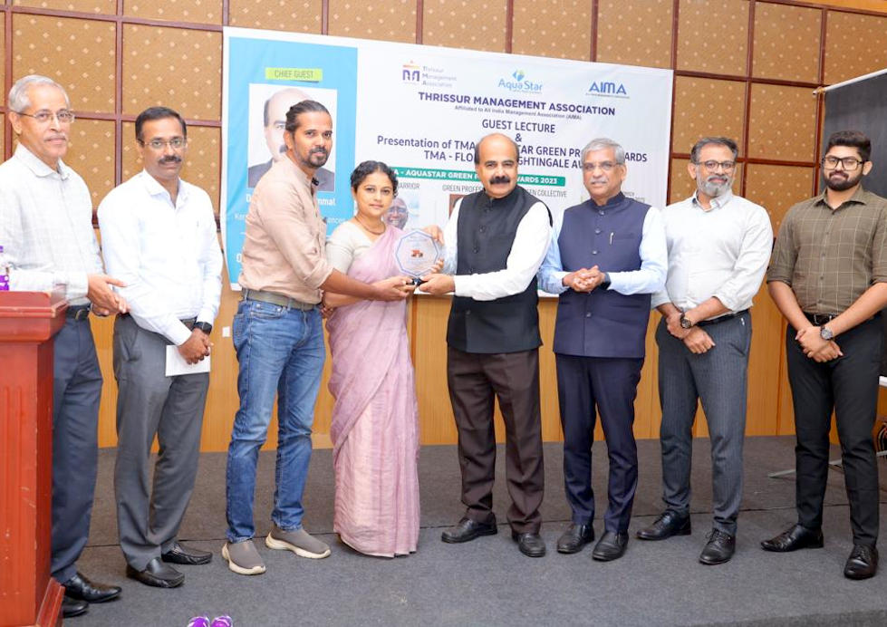 Ar. Guruprasad & Ar. Manasi receiving Green Professional award.
